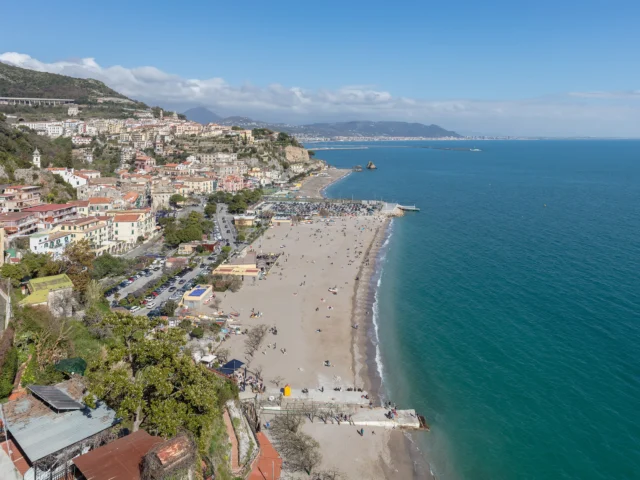 View of Vietri sul Mare, with the town, beach and sea.